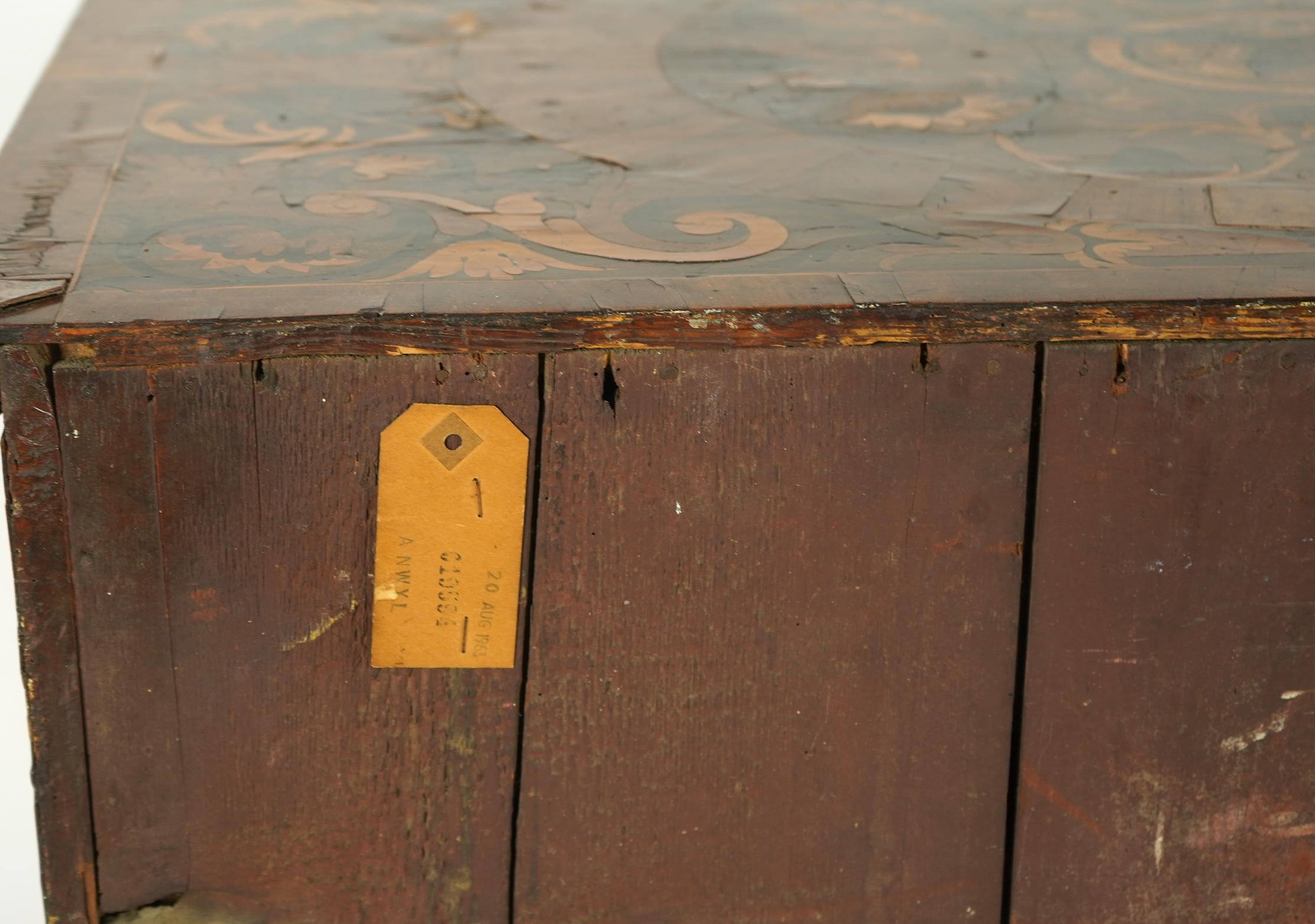 A William and Mary walnut and floral marquetry chest on later bracket feet